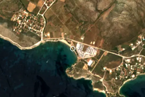 Satellite image of Charakas Beach and its surroundings
