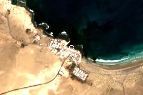 Satellite image of Playa de las Palomitas and its surroundings